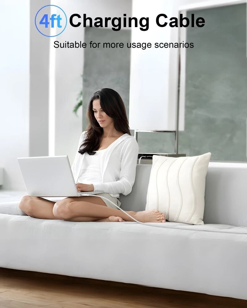 Woman using a laptop on a couch with text about a 4ft charging cable