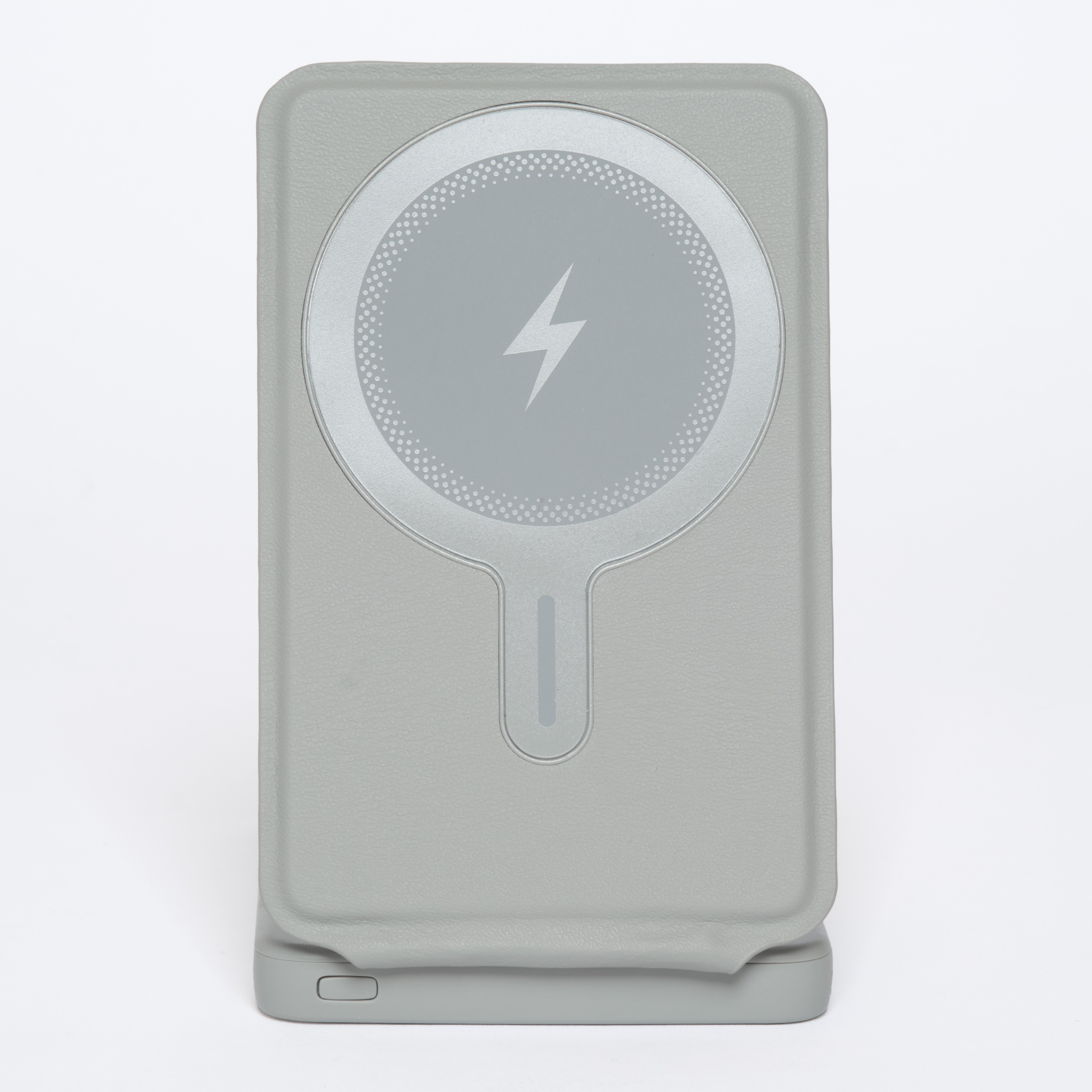 Gray wireless charging pad with lightning bolt symbol magsafe compatible