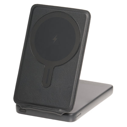 Black wireless charging stand on a white background